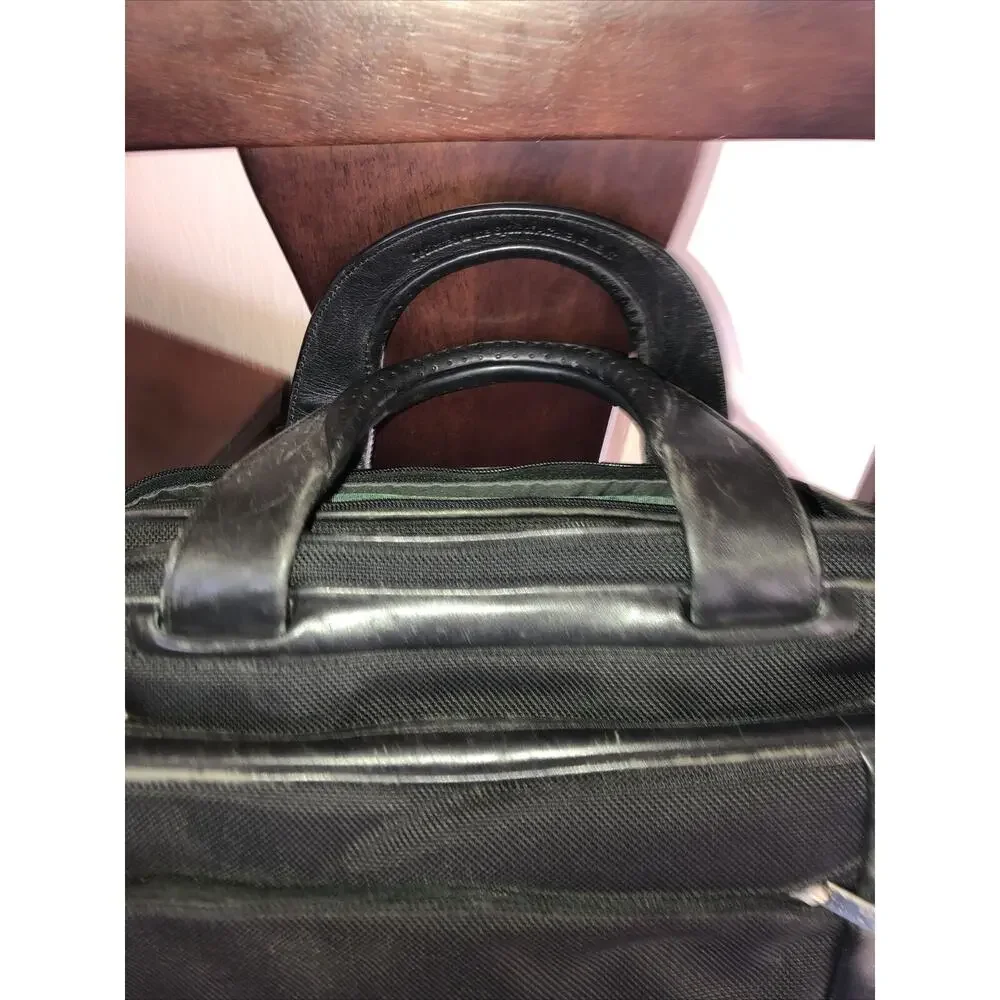 Tumi expandable leather